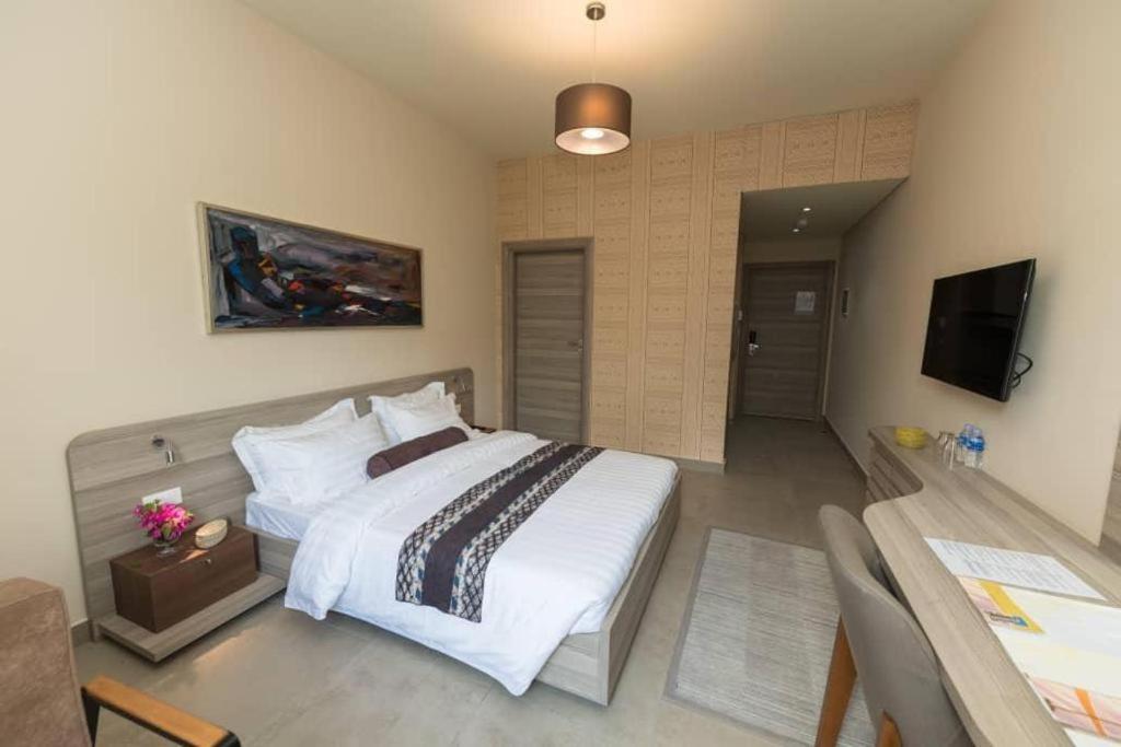 Roots Hotel Apartments أبيدجان المظهر الخارجي الصورة