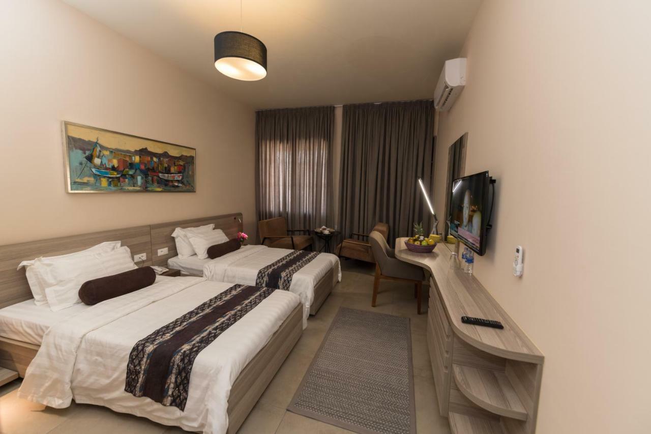 Roots Hotel Apartments أبيدجان المظهر الخارجي الصورة