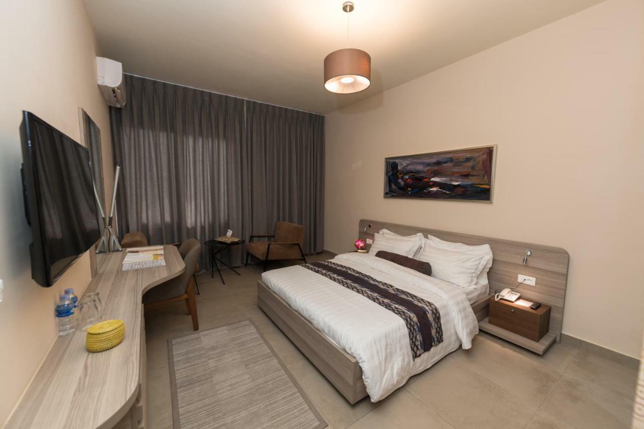 Roots Hotel Apartments أبيدجان المظهر الخارجي الصورة